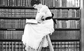woman_reading_on_top_of_ladder_1920